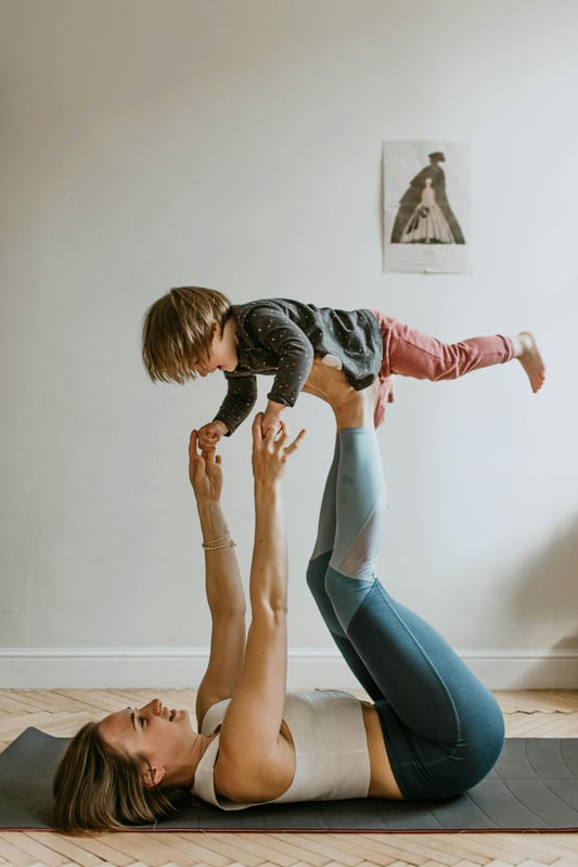 Mom exercising with child Mom exercising with child